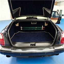 2001 Bentley Arnage Red Label Saloon

Registration: BU51 TGX
Engine: 6.75-litre turbocharged V8 petrol
Transmission: Automatic
Odometer reading: 39,942 miles
Colour: Black Sapphire metallic
Interior: Magnolia leather with burr walnut veneers
Previous owners: 3
V5C: Present
Service history: Good service records

An exceptional Bentley Arnage Red Label Saloon, finished in Black Sapphire metallic, a very dark blue, with a Magnolia leather interior, contrasting dark blue carpets and extensive burr walnut veneers. The car displays an odometer reading of approximately 39,942 miles.

The Arnage Red Label combined Bentley’s renowned 6.75-litre turbocharged V8 engine with automatic transmission, delivering effortless performance in a traditionally appointed luxury saloon. The model is distinguished by its imposing proportions, characteristic Bentley radiator grille and finely crafted interior.

Presented in excellent condition throughout, the bodywork and metallic paint finish appear particularly well preserved, complemented by clean brightwork and the correct Bentley alloy wheels. The engine bay is also notably well detailed.

The interior presents exceptionally well, retaining its Magnolia leather upholstery, polished burr walnut veneers, original factory instrumentation and switchgear. The leather displays only light creasing consistent with careful use.

The car has had three previous owners and is accompanied by good service records.

Features

• 6.75-litre turbocharged V8 petrol engine
• Automatic transmission
• Black Sapphire metallic paintwork
• Magnolia leather interior
• Contrasting dark blue carpets
• Burr walnut veneers
• Electrically adjustable front seats
• Air conditioning
• Factory instrumentation and switchgear
• Bentley alloy wheels
• Right-hand drive
• Odometer reading of approximately 39,942 miles
• Three previous owners
• Good service records
• V5C present

This vehicle forms part of the Estate of the Late John Sills and is offered for sale by the Executors, confirming a genuine reason for sale.