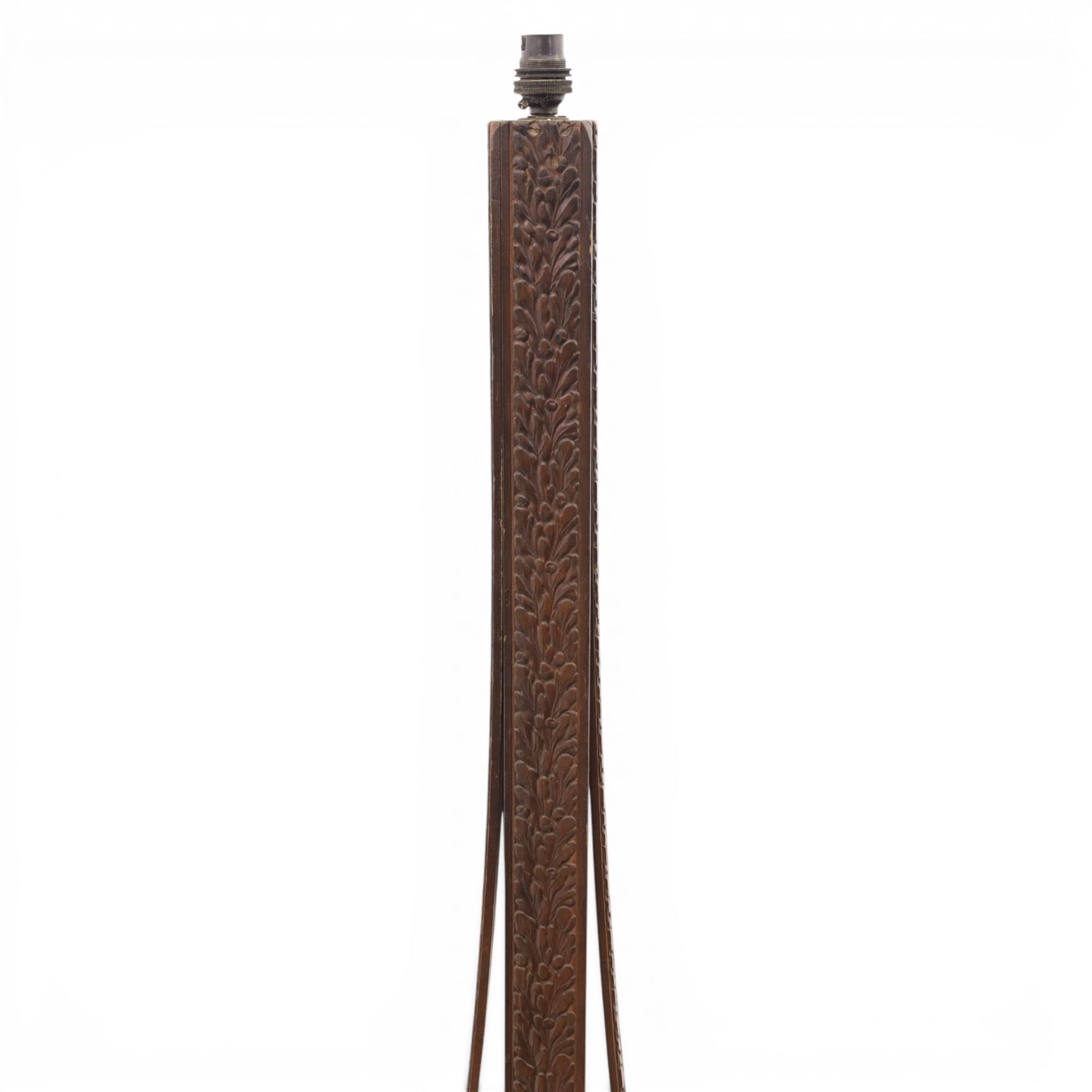 20th century stained wooden standing lamp, four foliate carved splayed supports, with square table platform, united by cruciform stretcher base, H158cm