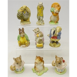  Nine Beswick Beatrix Potter figures comprising 'Tommy Brock', 'Samuel Whiskers', 'Sir Isaac Newton', 'Timmy Willie', 'Mr. Alderman Ptolemy', 'Tabitha Twitchit and Miss Moppet', 'Squirrel Nutkin' and two 'Mrs. Tittlemouse' (9)  