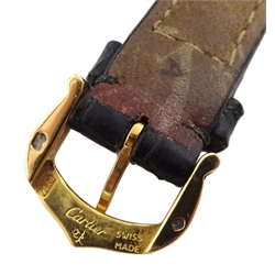 Two Cartier 18ct gold watch strap buckles, stamped 750, with Must de Cartier box 