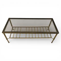 20th century brass and glass topped coffee table, the rectangular glass top within brass frame, upon four reeded legs united by lower slatted under tier 