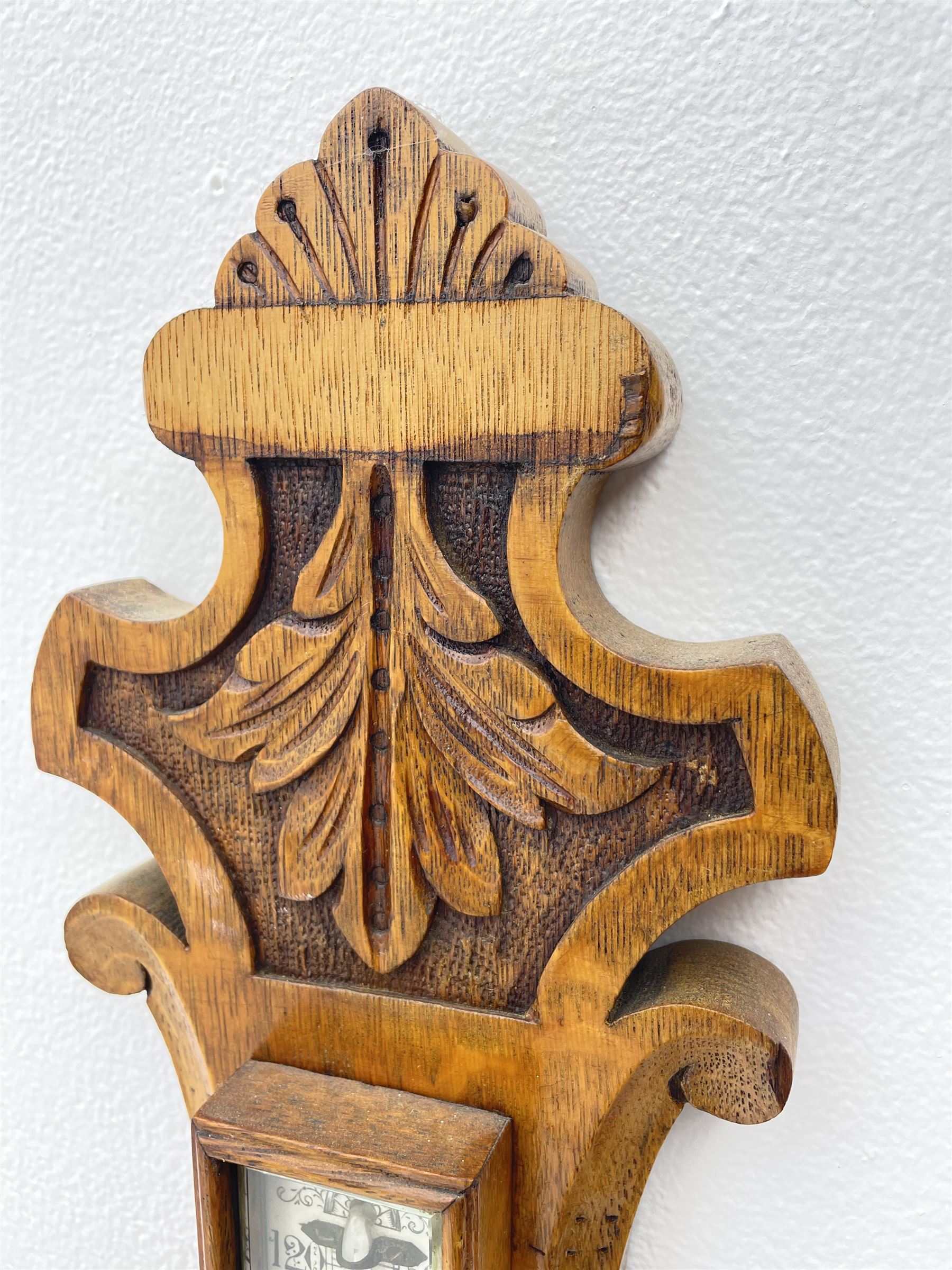Early 20th century carved oak card aneroid barometer with visible aneroid and mercury thermometer, by ‘C. J. Gowland, Sunderland’ 