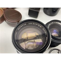 Collection of camera bodies and lenses, to include Olympus OM-1 camera body, serial no 106567, with 'Olympus OM-System F.Zuiko Auto-S 1:1.8 f=50mm' lens, serial no 135097,  Zenit-B camera body, serial no 71017867, with 'Helios-44-2 2/58' serial no 7500040, Voigtlander Vito B camera body, with 'Voigtlander Colour Skopar 1:2.8/50' lens, 'Olympus OM-System Zuiko Auto-Zoom 1:4 f=75-150mm' lens serial no 104321, 'Tamron SP 35-210mm 1:3.5-4.2' lens etc 