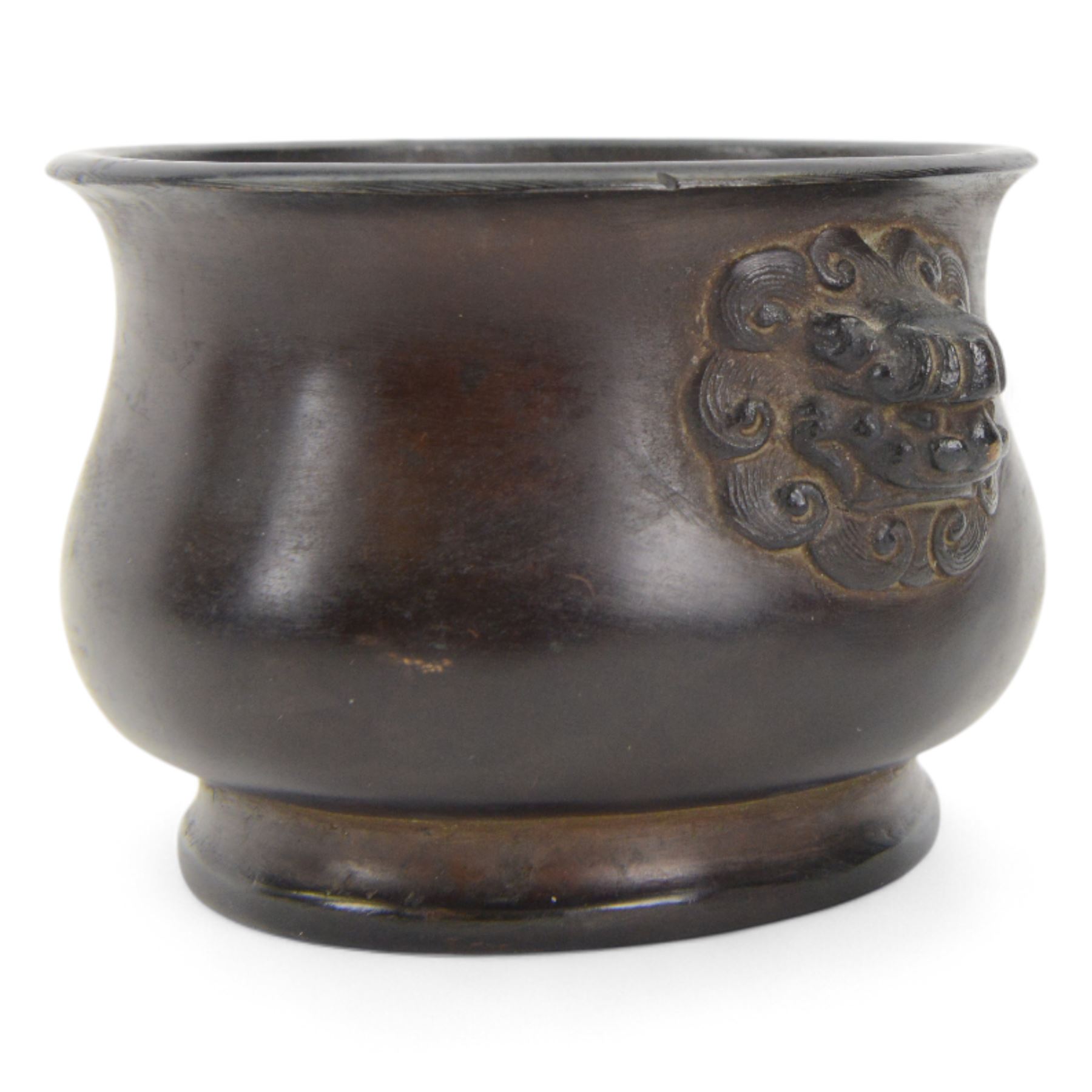 Chinese bronze censer, of circular bellied form with temple lion mask handles, upon a circular foot, with apocryphal six character Xuande mark within a border of two dragons chasing a pearl, H7.5cm D10/5cm
