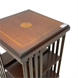 Edwardian revival inlaid mahogany revolving bookcase, square form with moulded top inlaid with central fan motif, two-tiers with moulded upright rails, on castors 