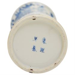 19th century Chinese sleeve vase decorated in blue and white with panels of mother and child within a floral and scroll surround, four character Kangxi mark H27cm