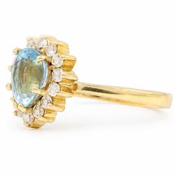 18ct gold aquamarine and diamond cluster ring, single pear cut aquamarine of approx 0.95 carat, surrounded by fourteen round brilliant cut diamonds, stamped 750