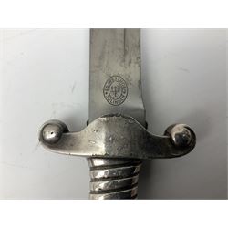 German Reichsarbeitdienst RAD Leader's Hewer dagger, the 26cm single edged scimitar shaped blade with narrow fuller, etched Arbeit adelt; by E.D. Wusthof, Solingen; the aluminium hilt with spade and wheat ear langet; two piece white plastic grip and eagle head pommel; pebbled steel scabbard engraved with ears of wheat and strapwork with double leather hangers L40cm overall