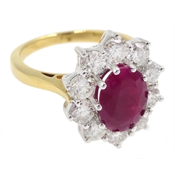 18ct gold ruby and diamond cluster ring, hallmarked, ruby approx 2.25 carat, total diamond weight approx 1.50 carat