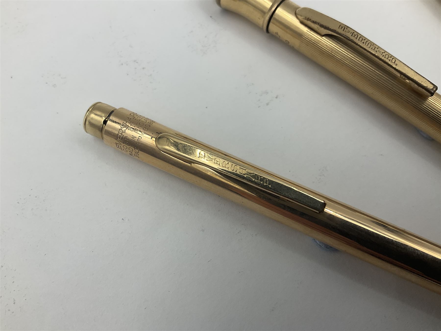 Five gold filled Wahl Eversharp propelling pencils, together with a silver propelling pencil, hallmarked London 1946, J.M.Co Johnson, Matthey & Co, and two further gold filled propelling pencils, one with box, largest L13cm (8)