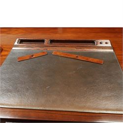 Dyrlund - Santos rosewood office suite, comprising an executive desk and cream leather upholstered swivel chair, the desk with a broad rectangular top with rounded corners, leather writing surface, pen compartments and letter tray, three lockable frieze drawers with fitted interiors above a central kneehole flanked by floating drawer pedestals, the left housing a filing drawer and the right three compartmented drawers, with a full width modesty panel to the reverse, chair raised on a castor base, H 116cm, W 62cm, D 74cm