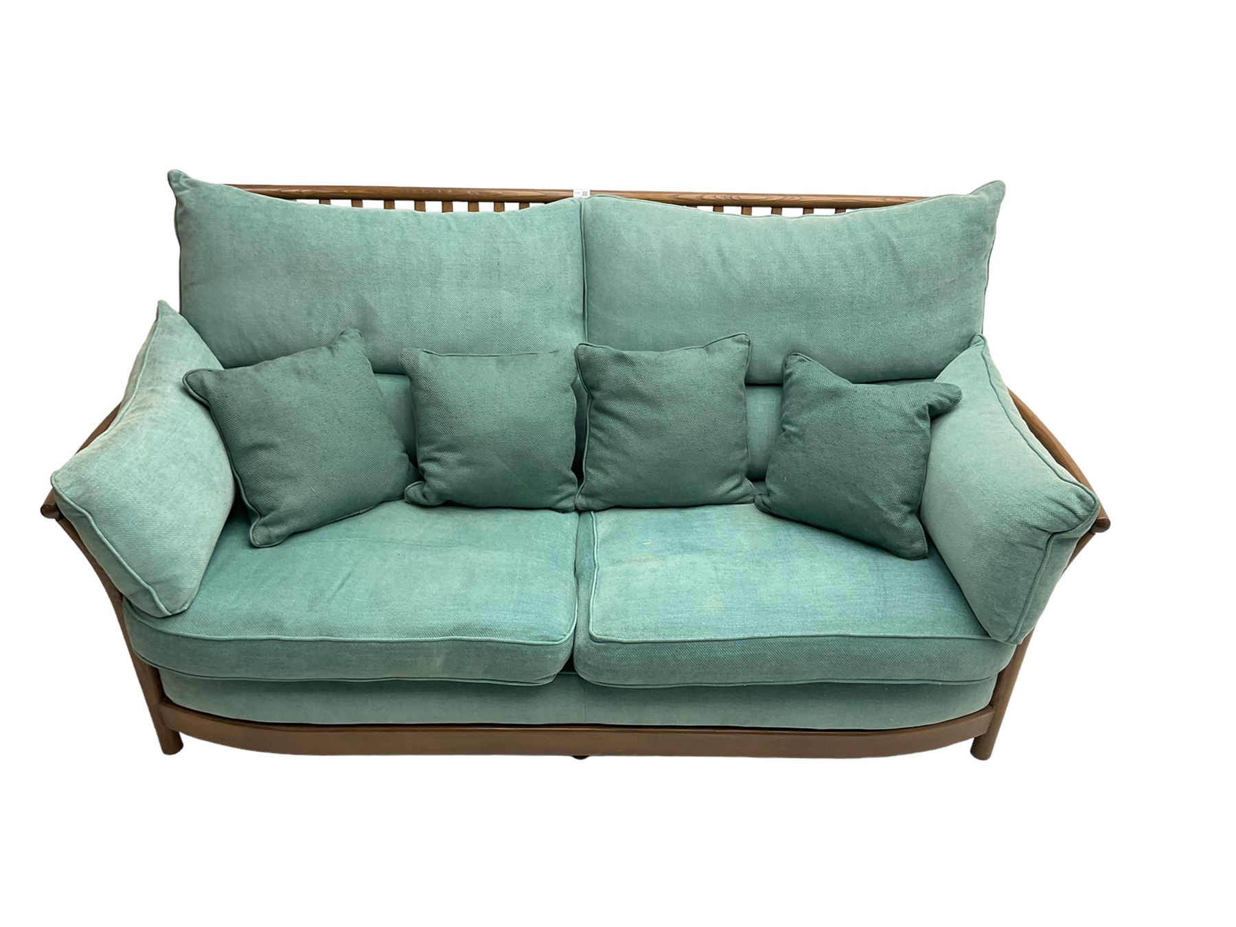Ercol - 'Renaissance' large two seat sofa, loose cushions upholstered in teal fabric 