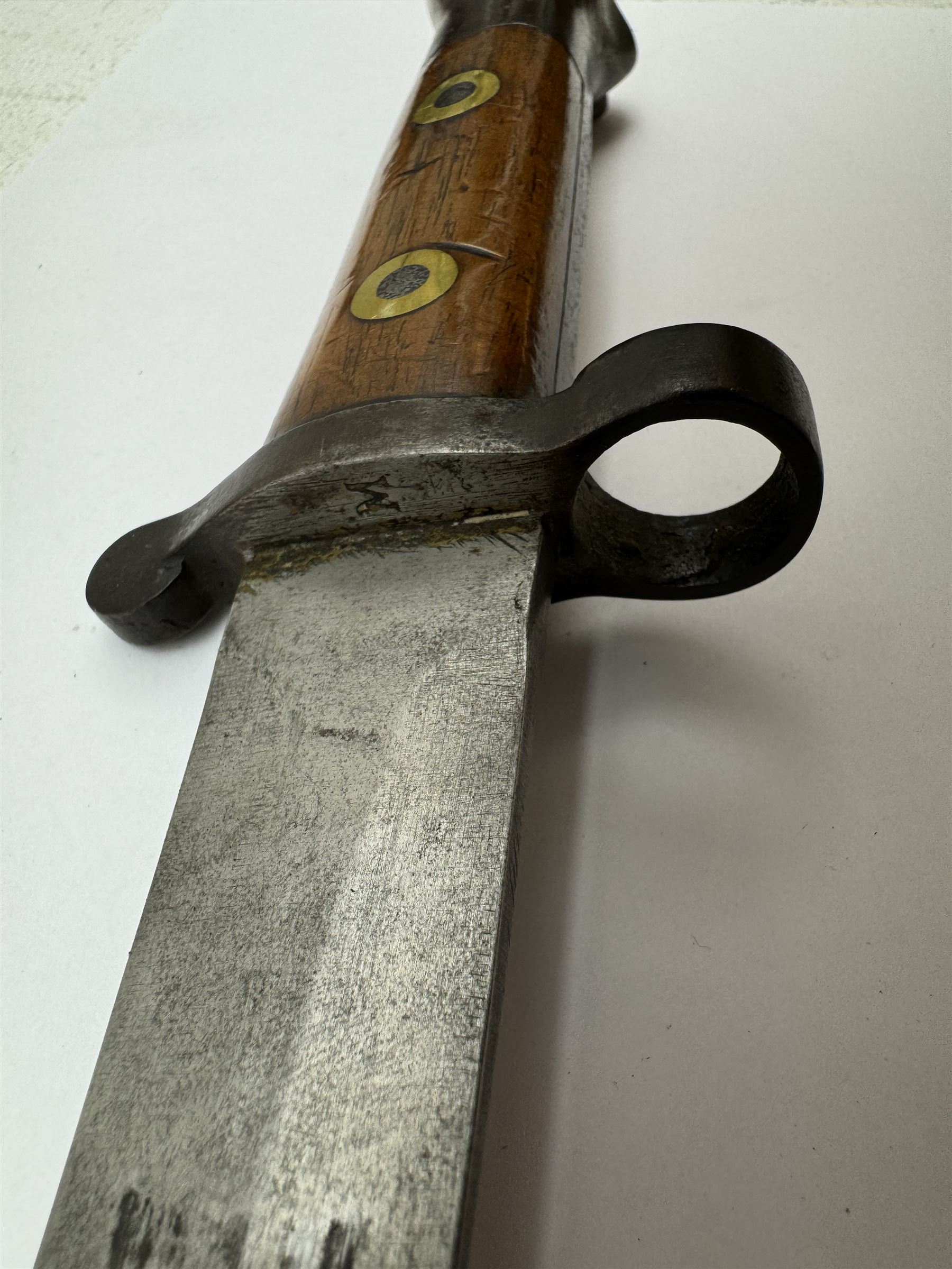 WWII Lee Metford rifle bayonet with original scabbard marked 586, with canvas frog, L44cm overall 
Notes; due to the condition of the bayonet it is possible this was issued to the home guard