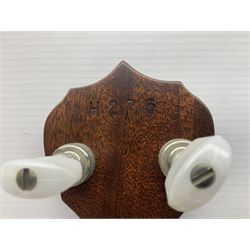 Deering seventeen-fret tenor banjo with cast metal body, serial no.H275, L79cm overall; in fitted hard carrying case