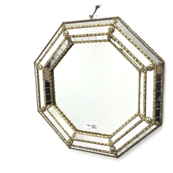 Small octagonal wall mirror with gilt detailing, W41cm, H41cm