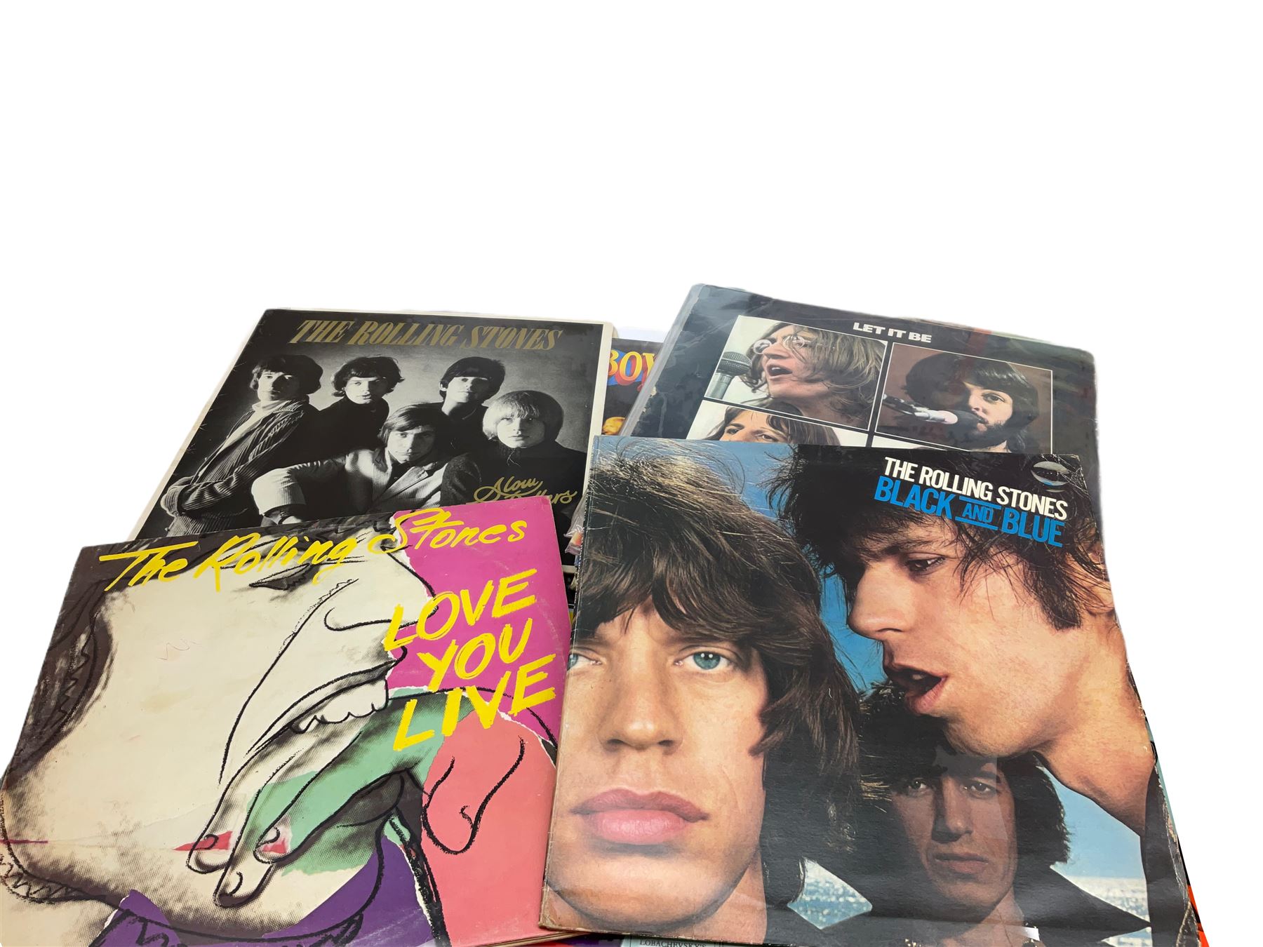 Over seventy LP records 1960s/70s/80s including seven Beatles, five Rolling Stones, Cliff Richard and The Shadows, Isaac Hayes, Jackson Browne, The Osmonds, Beach Boys, Duane Eddy, Buddy Holly, Elvis Presley, Carpenters, Thin Lizzy, Meat Loaf, Black Sabbath, Dubliners etc; and twelve 10