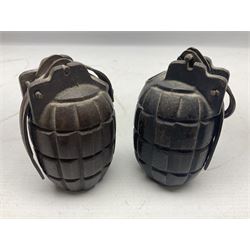 Two inert WW2 Mills Bomb (pineapple) hand grenades; one adapted as a money box with coin slit to the side and later cap H9.5cm (2)