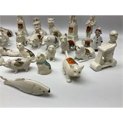Collection of figural crested ware, to include Carlton Chins John Bull Alnwick, Clifton China Cheshire Cat,  Arcadia pig, Crafton crawling baby and another seated baby, quantity of cat, dog and pig figures, two Willow Art Model of Bunyans Statue, Toby jug, Victoria China, Arcadan bulldog, fish etc