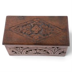Carved oak box, the hinged lid with a carved diamond motif, the sides and front carved with stylised flowers, H12cm, L24cm