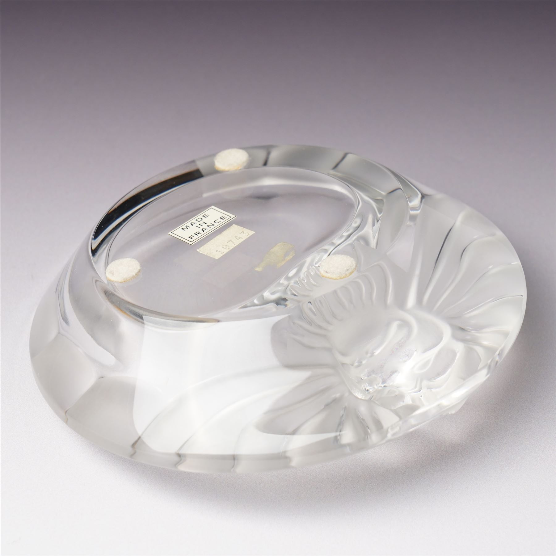 Lalique Lions Head glass ashtray and an 'Anemone' flower, both marked Lalique, France and boxed (2)