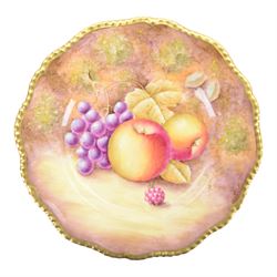 20th century Royal Worcester footed bowl, hand painted with gilt interior, the exterior a still life of fruit upon a mossy ground, signed Freeman, with black printed mark beneath, together with plate side plate and cabinet plate, bowl, H8cm, D13cm