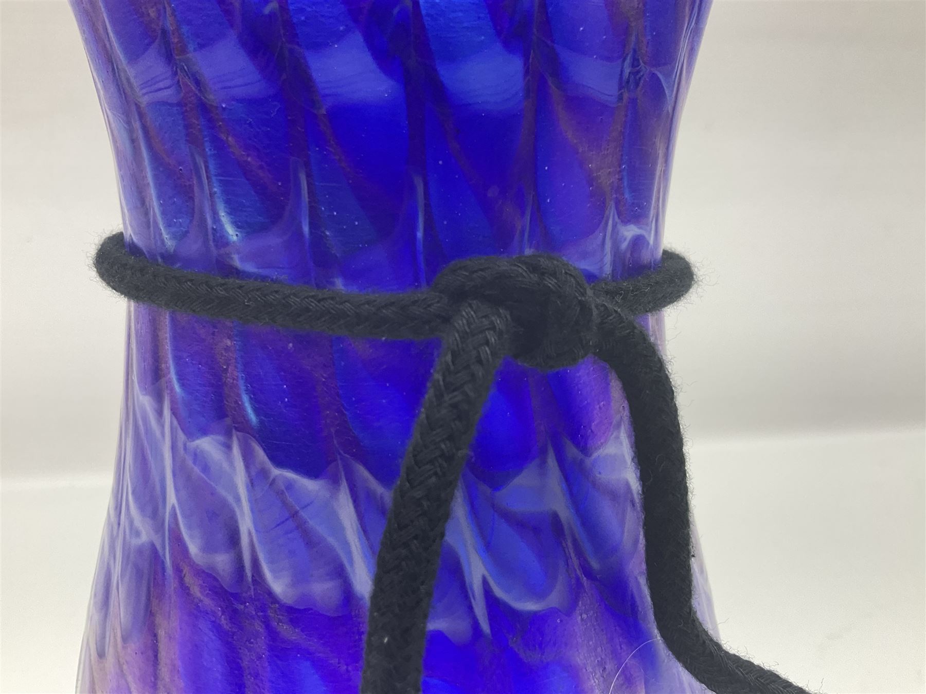 John Ditchfield for Glasform studio glass vase, with mottled wave design upon an iridescent purple ground, signed and numbered beneath, with certificate of authenticity tag, H26.5cm