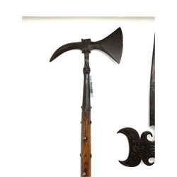 Large continental steel halberd axe the engraved blade with cast sunburst centre and long studded ash handle L219cm; and another halberd with plain ribbed blade and studded ash handle with ground spike (2)