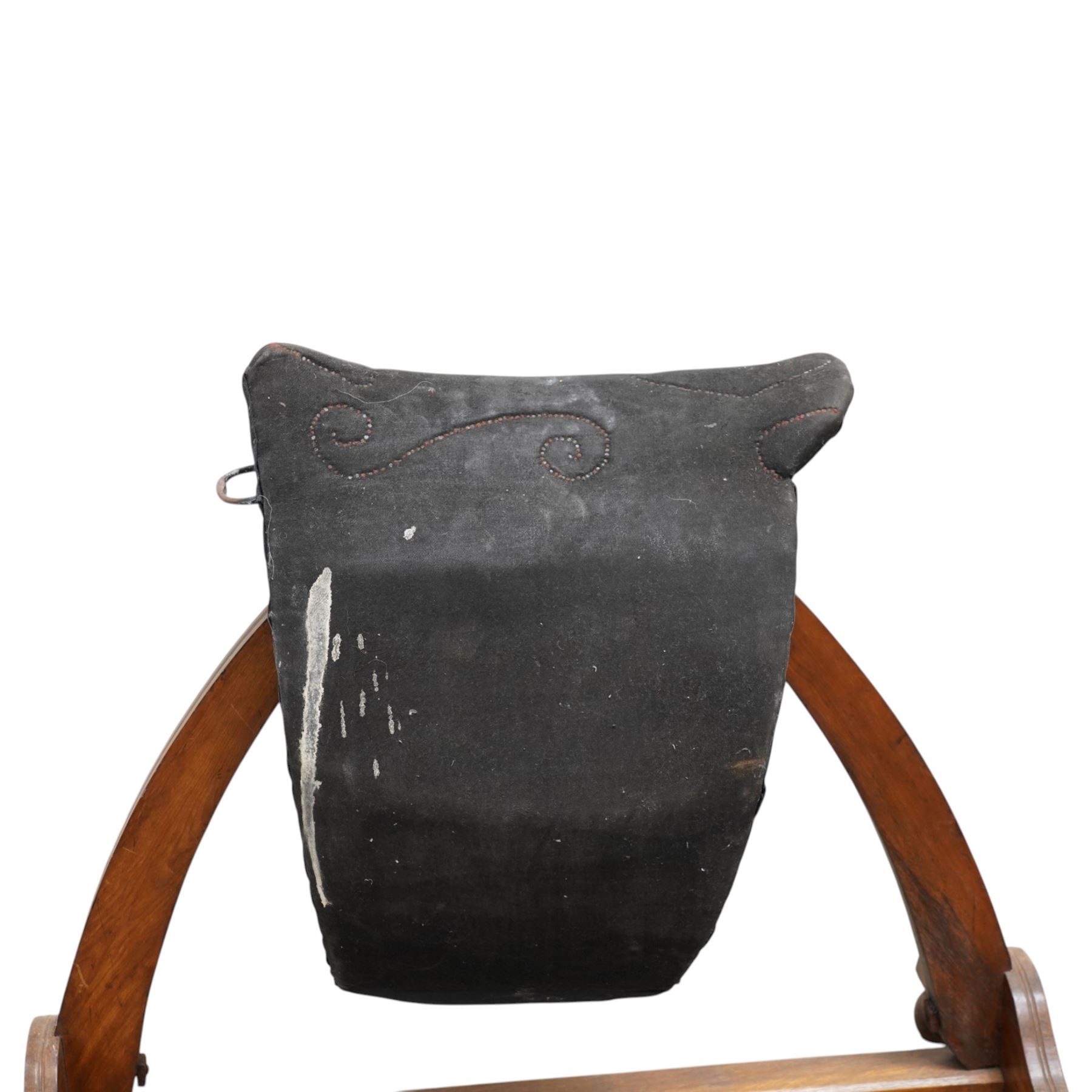 Carlton's - early 20th century weight bearing saddle stand, the top part allowing for the movement of the saddle, on curved oak trestle, marked Carlton's Registered