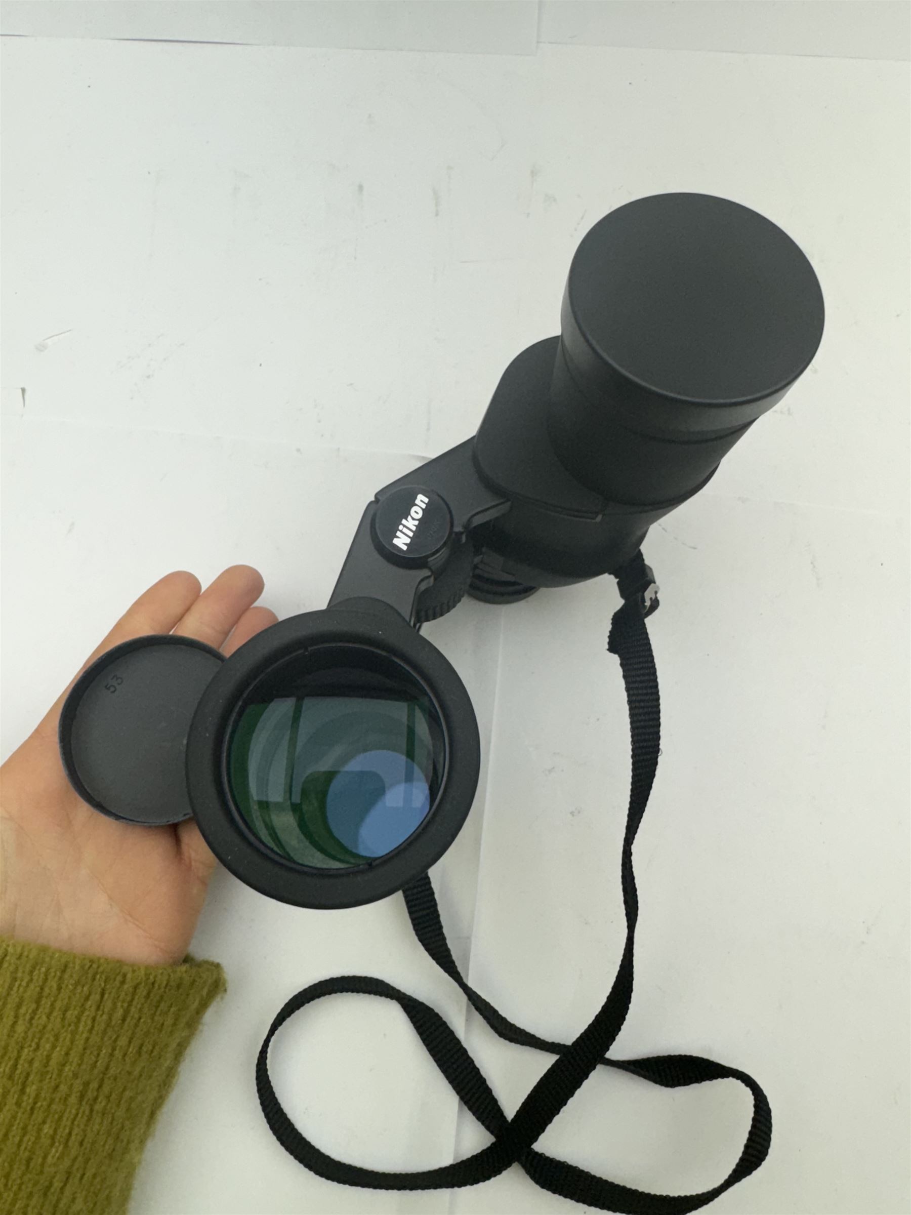 Four pairs of binoculars, to include Carl Zeiss Jena Jenoptem 8x30W serial no. 3750814, Nikon Sporting II 8x40 serial no. 604672, Minolta Pocket II 8x22 Field 7 and Jessops 12x25 Field 4.8 84m/1000m, all in carrying cases 