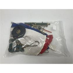 Action Man - five figures marked on the back 'Made in England by Palitoy under licence from Hasbro 1964', one dressed as a German Stormtrooper, one as a Red Devil Pilot and three in army uniform; another similar action figure marked to the right buttock ' G.I. Joe Copyright 1964 by Hasbro Patent Pending Made in Canada' dressed in army uniform; together with an Action Man jeep, field gun, mortar and machine guns and other accessories including helmets and weapons, parachute, diving equipment, skis and snow shoes, boots, uniforms etc; all unboxed