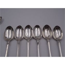 Group of Victorian silver fiddle pattern spoons, comprising pair of sauce ladles and set of six teaspoons, both hallmarked Henry Holland (of Holland, Aldwinckle & Slater), London 1857, set of four table spoons, hallmarked Chawner & Co (George William Adams), London 1857, and set of six dessert spoons, hallmarked Chawner & Co (George William Adams), London 1856, with monogrammed terminals, approximate total silver weight 25.50 ozt (792.6 grams)