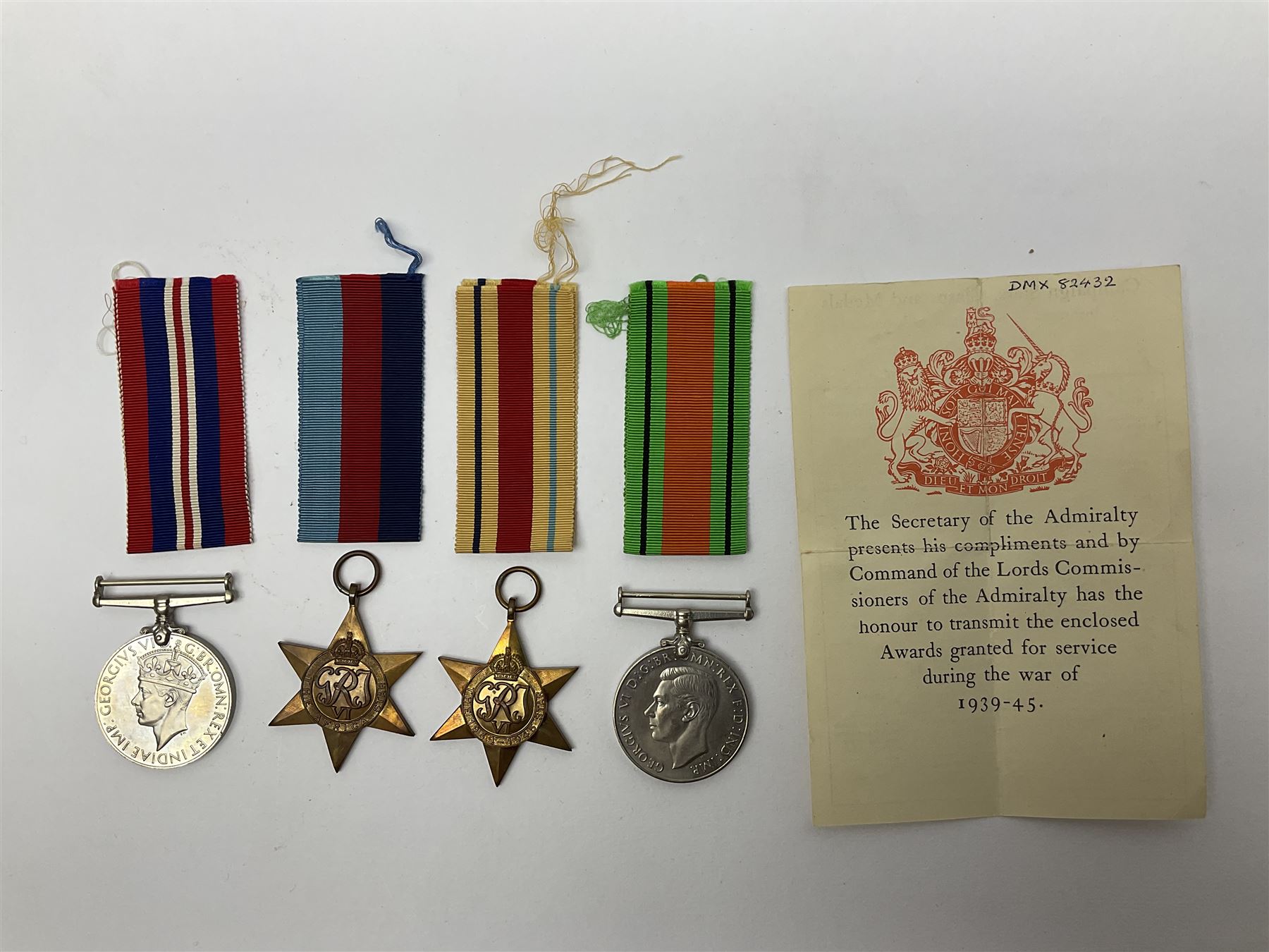 Twelve WW2 medals comprising four 1939-1945 war medals, four Defence medals, three 1939-1945 Stars and Africa Star; all with ribbons; some as groups in two issue boxes with slips