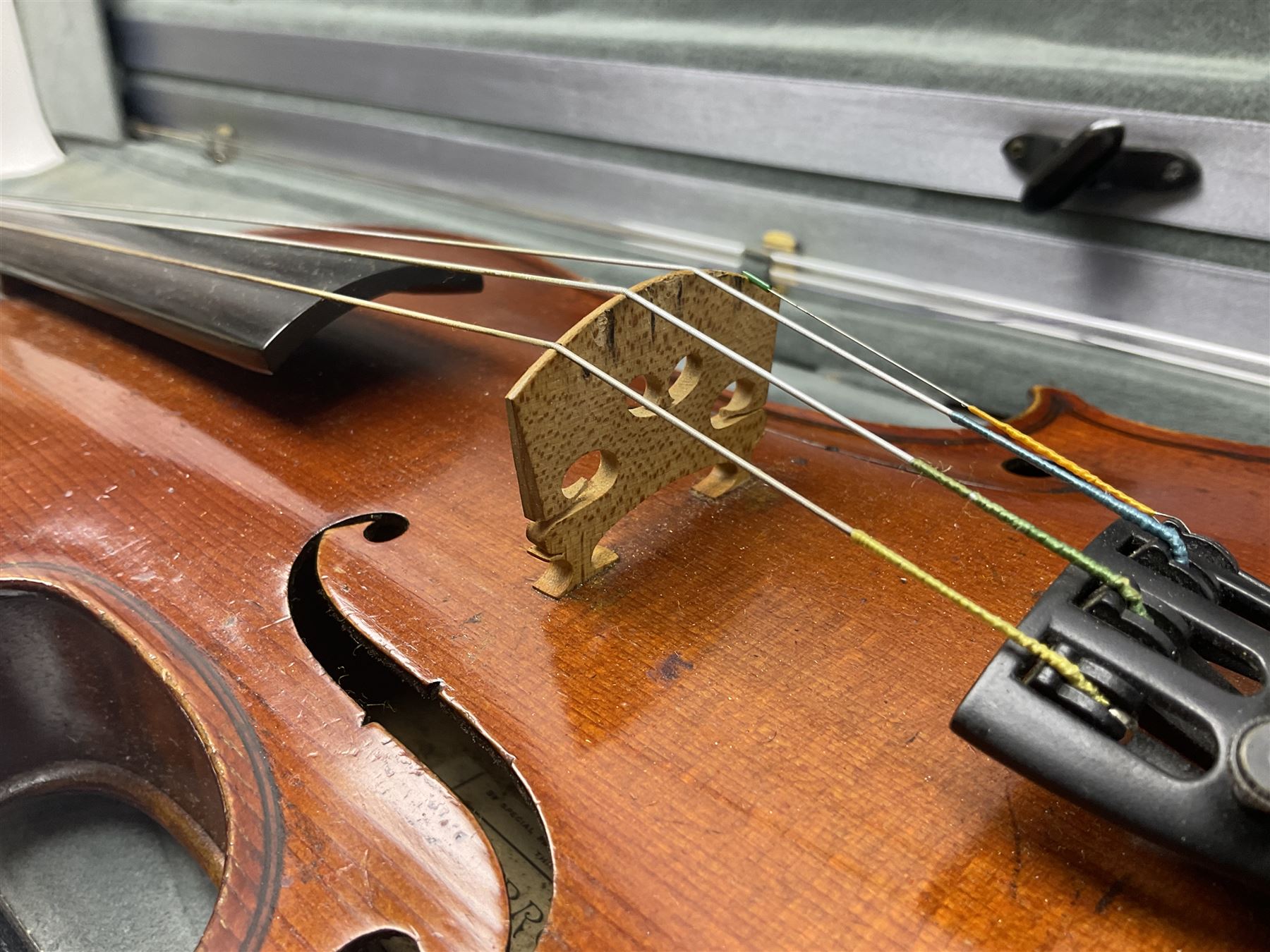 Early 20th century French Mirecourt violin with 35.5cm two-piece maple back and ribs and spruce top; bears label 'The Garrodus Violin H & Co No.1587 Anno 1912' L59cm overall; in modern fitted case with bow
