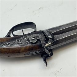 19th century double-barrelled percussion pistol, the octagonal, over and under, barrels with remains of the signature 