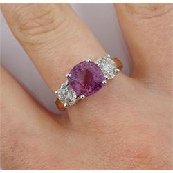 18ct gold three stone round pink sapphire and round brilliant cut diamond ring, hallmarked, sapphire approx 2.90 carat, total diamond weight approx 1.05 carat