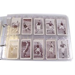 Collection of 1930s and later Football related trading and cigarette cards, including complete set of sixteen 1936 Topical Times Panel Portraits of Star Footballers, collection of further 1930s Footballer Panel Portraits, complete set of twenty-five 1955 The Wizard Famous Footballer cards, complete set of fifty Wills Association Footballers 1935, complete set of fifty Godfrey Phillips International Caps cards, etc, housed in three albums