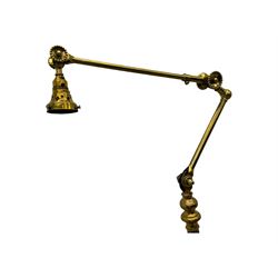 Early 20th century brass adjustable floor lamp, Royal Doulton decorative ceramic base embellished with raised floral and scroll patterns, stamped, brass column and adjustable arms terminating in brass bulb holder