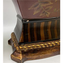 Pair Oriental table lamps decorated with birds in a tree with fruit, on a red ground with a gilded base together with cream lampshades H57cm, without lampshade. 