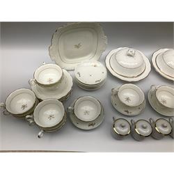 Victorian teawares, decorated with gilt sprigs upon a white glazed ground, to include two tureen and covers, two cake plates, cups, saucers, side plates, etc. 
