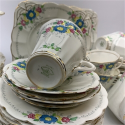 A Plant Tuscan china tea set, comprising teapot, fourteen teacups and fourteen saucers, twelve side plates, milk jug, cream jug, slop bowl, open sucrier, and two sandwich plates, together with a selection of Victorian dessert wares, and matched tea cups and saucers. 