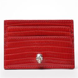 Alexander McQueen - a leather card holder in red lizard-effect leather, with multiple card...