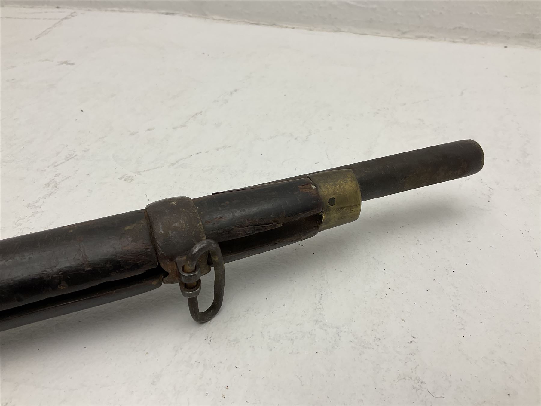 20th century Indian percussion musket, the 76cm barrel with two bands, indistinctly inscribed lock-plate, walnut full stock stamped 642 with brass butt and trigger guard and under barrel ramrod channel L121cm overall