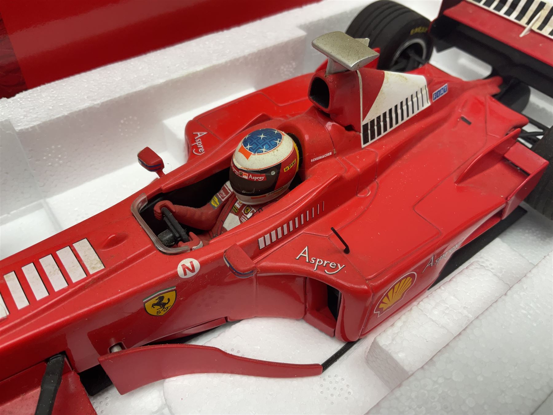 Four Paul's Model Art 1:18 scale Michael Schumacher Collection die-cast racing cars - Ferrari F310B; Ferrari F310/2; Benneton Renault B195; and Ferrari F300; all boxed (4)