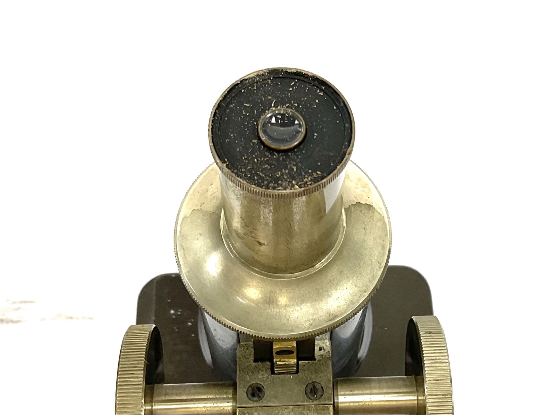 Black finished monocular microscope by Prior London No. 17372,  with pitchfork base and rack and pinion focusing, in original fitted wooden case with additional lenses, H32cm, together with Watts dumpy level, no. 116249, in a leather case