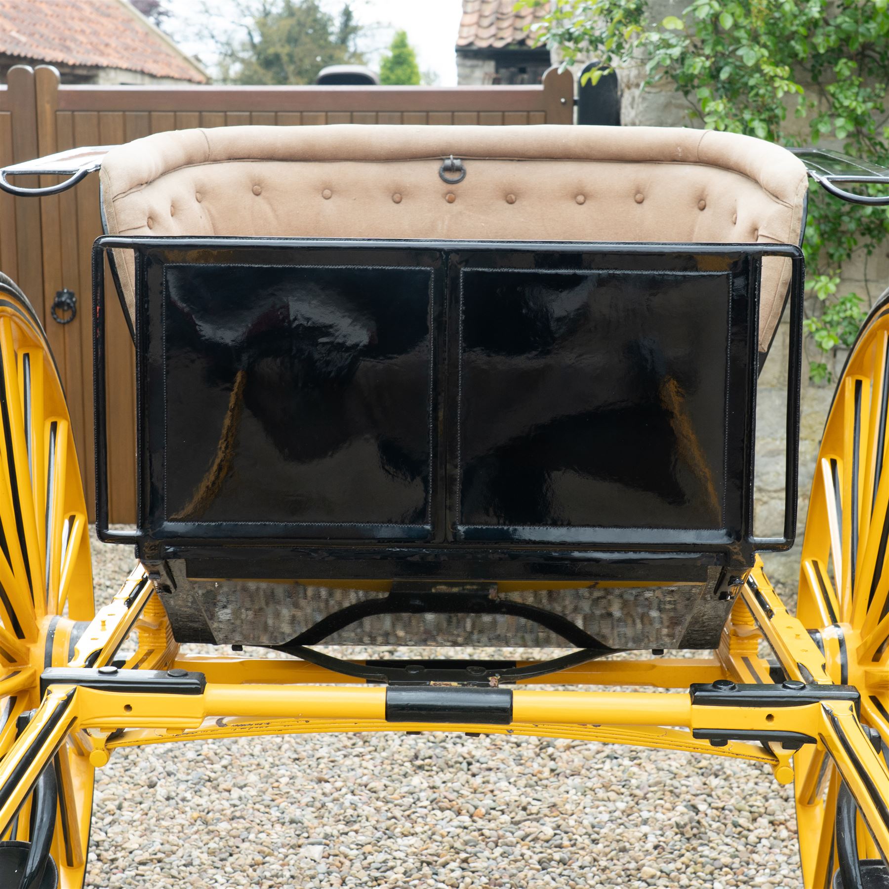 Victorian Two Wheeled Pleasure Driving Round Back Gig by Shanks of London

A Victorian two wheeled pleasure driving round back gig, painted in black and yellow, with upholstered forward facing seat for two, panelled dashboard, wooden spoked wheels, iron step and shafts for a single horse. The vehicle is fitted with a rear luggage compartment and mounted on elliptic springs.

Features
• Black and yellow painted body
• Upholstered forward facing seat
• Panelled dashboard
• Rear luggage compartment
• Wooden spoked wheels
• Iron step
• Elliptic spring suspension
• Shafts for a single horse

Dimensions:
Overall length: 310 cm
Width: 160 cm
Body width: 82 cm
Height: 160 cm

Wheel Diameters:
Wheels: 138 cm

Seating:
Driver and passenger: 2