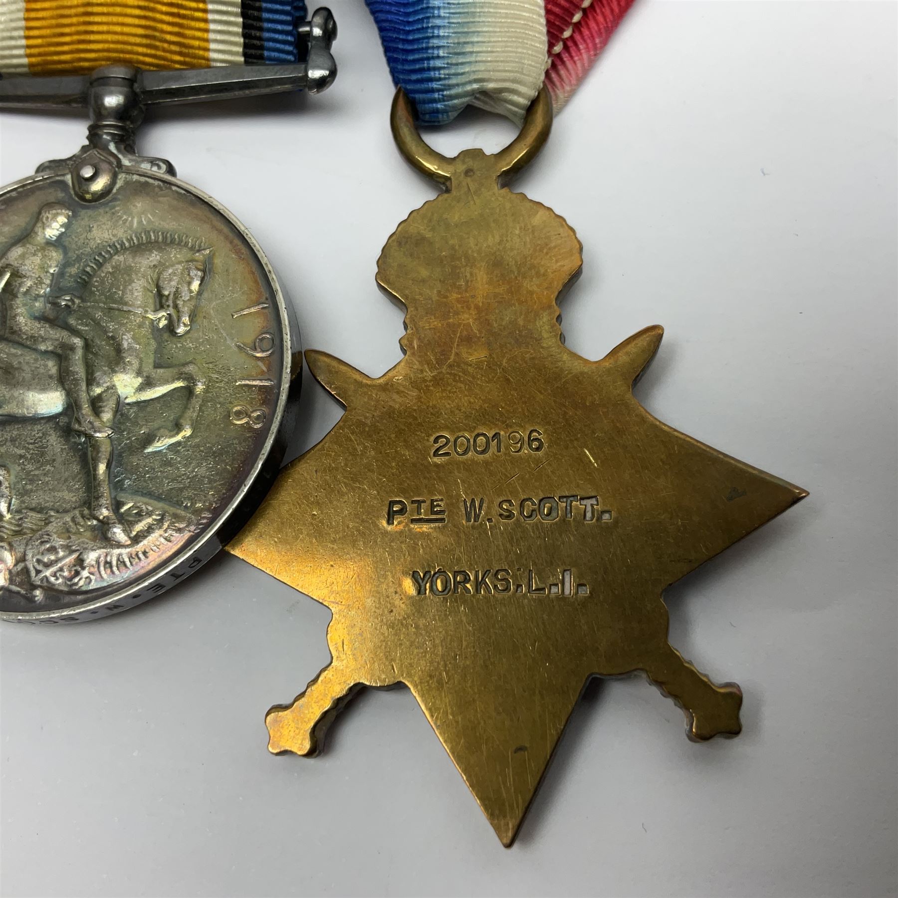 WWI trio of medals comprising British War Medal and Victory Medal awarded to 1815 Pte. W. Scott K.O.Y.L.I. and 1914-15 Star awarded to 200196 Pte. W. Scott Yorks. L.I.; with ribbons on wearing bar