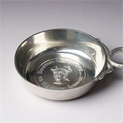French silver tasse de vin with Minerva's head and makers mark J.P. with an anchor, the rim engraved C Mouly, Spanish tasse de vin inset with a silver coin and two other tasse de vin (4)