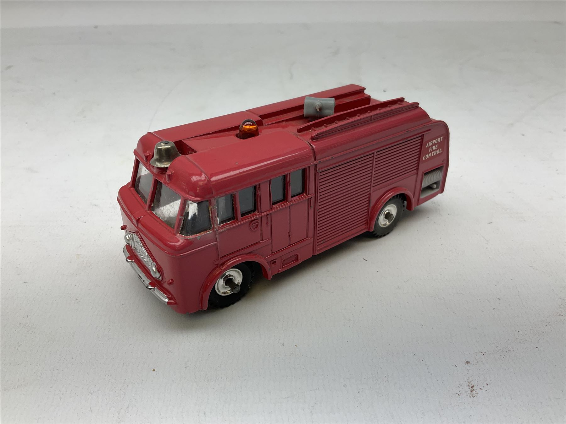 Dinky - Captain Scarlet and the Mysterons Maximum Security Vehicle with crate No.105; Airport Fire Tender with Flashing Light; and Michigan 180-III Tractor Dozer No.976; all boxed (3)