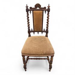 Pair of 19th century oak hall chairs, shield form backs with carved scroll cresting and finial uprights, upholstered in tan velvet, on turned and block supports joined by stretcher rails
