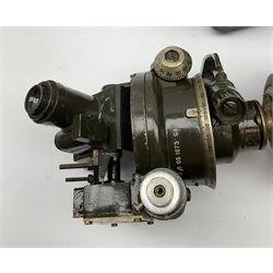 WW2 green painted brass military artillery theodolite, marked 'Director No.7 (Mk.2) OS 1873 GA', dated 1942, serial no.11435, on oak and brass telescopic tripod with green painted metal carrying case; together with five additional unrelated oak and brass telescopic tripod legs